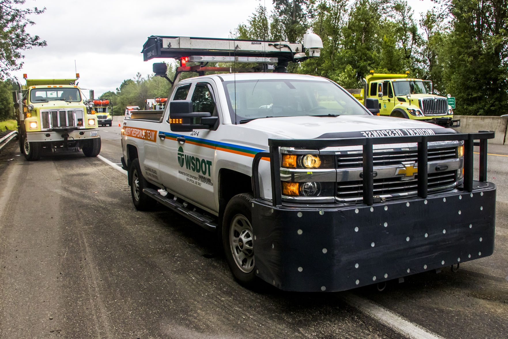 Crews Work To Clean Up Oil After Tanker Overturned